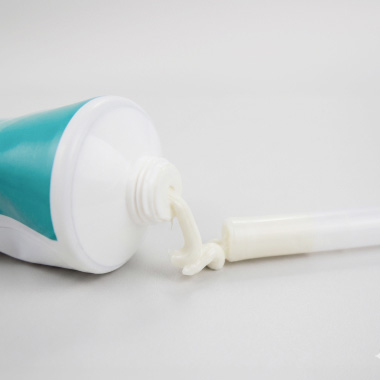 Close-up of an ointment and applicator