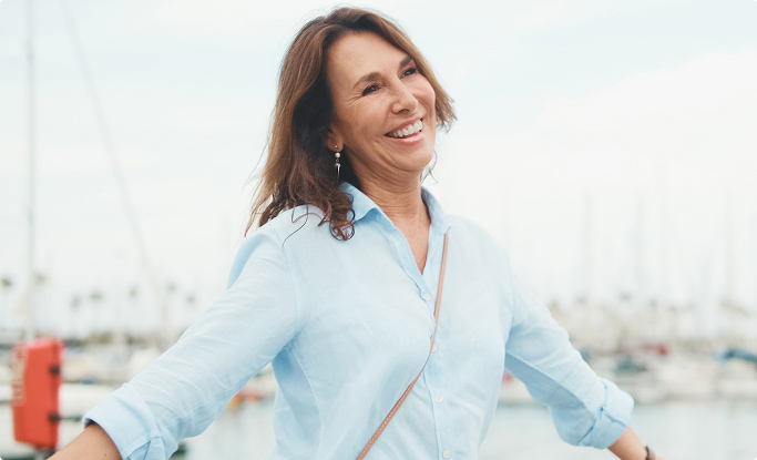 A relaxed woman sitting on a sofa
