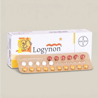 Une plaquette de pilules contraceptives sur fond rose